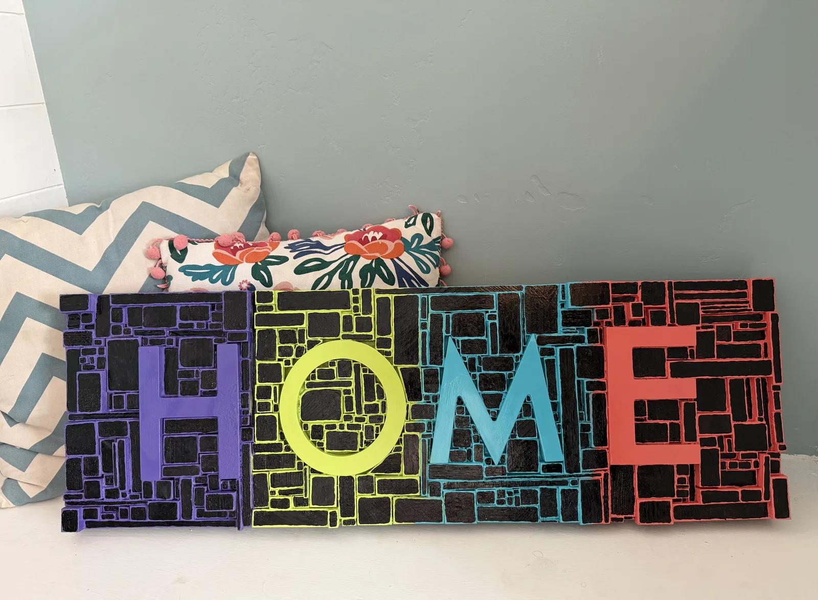 Finished HOME sign with each letter in a different bright color